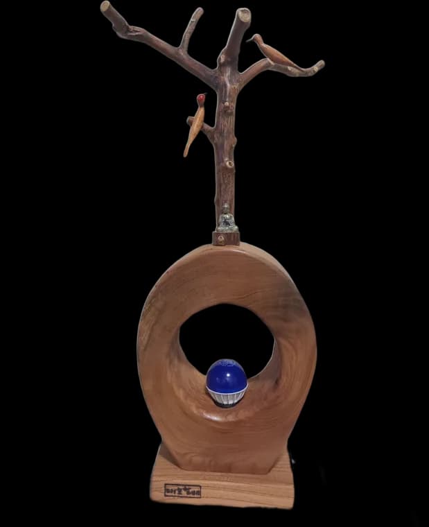 Bird on the Ring — root-wood sculpture by Teho Halbae