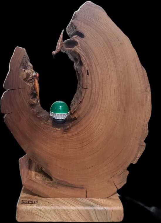 Green Crescent — root-wood sculpture by Teho Halbae