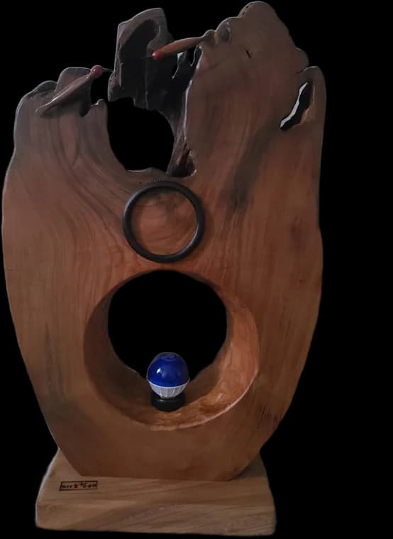 Ring and Stone — root-wood sculpture by Teho Halbae